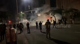 Federal agents fire tear gas and stun grenades to disperse Portland protesters