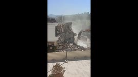Building destruction , dinosaur eating building, T Rex ,destruction la mairie Carnoux en Provence