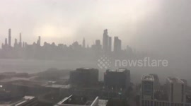 Ominous storm looms over NYC skyline