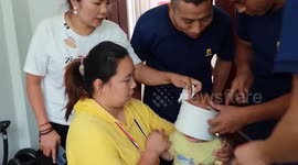 Firefighter cuts free boy's head from water pipe in China