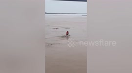 Retired athlete rescues fisherman who fell into river in northern China
