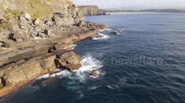 Aerial view of a cliff located in Asturias, Spain. Famous for bouldering and fishing. Nice place to scape from coronavirus social distance.