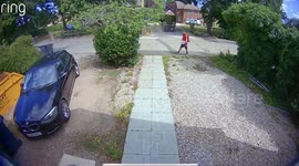 This video captures the heart-warming moment a postman hopscotches his way up a path to deliver mail