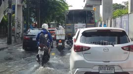 Roads flooded in Bangkok during morning rush hour after thunderstorms and rain