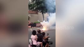 Chinese citizens set off fireworks in front of US consulate in Chengdu