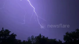 Watch as lightning flashes across the skies of New Jersey during early morning storms
