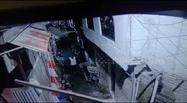 The man in the red hat was captured by a CCTV camera while stealing a motorcycle in a busy settlement when the situation was quiet in the morning.