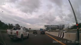 Durian Falls From Truck Hitting Car Behind