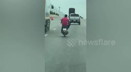 Careless motorcycle rider crashes into pavement