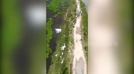 Defence force chopper airdrops relief material in flood-hit northern India