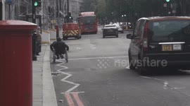 Social Distancing Men In Wheelchair Avoids People By Pushing His Wheelchair In The Street