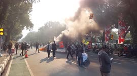 60 STUDENTS ARE CONDUCTING DEMO ACTION TAKEN RECLAMATION OF JAKARTA BAY (ANCOL) BY BURNING USED TIRE IN FRONT OF THE GOVERNOR'S OFFICE