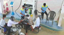 Motorbike bursts into flames while at gas station in northern India