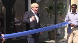 UK PM Boris Johnson attracts crowd at ribbon-cutting ceremony