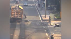 Tyres fly off moving truck and knocks down pedestrian in China