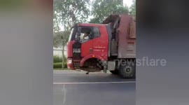 Truck driver fined after driving with front wheels missing in southern China
