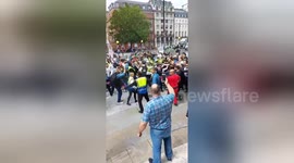 Police intervene as scuffles break out between Armenian and Azerbaijani groups in central London