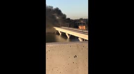 Locals watch smoke billow into sky after train derailment and bridge collapse in Tempe, Arizona