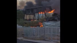 Union Pacific train derailed in Tempe Town Lake catching fire over bridge