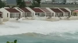 Whipping waves crash St. Maarten as Tropical Storm Isaias looms