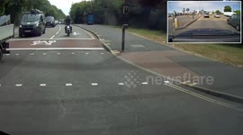 Learner Biker - Insane road rage, Wants to fight us. Then swerves into the path of a van, all because of his mistake.