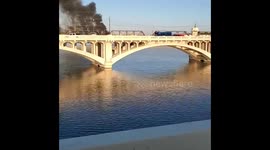 Massive fire on the bridge over Tempe Town Lake, Arizona caused by tran derailment