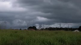 Dark storm clouds rolling in over the Kentucky countryside