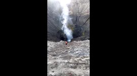 A brave man who got closer enough to the hottest zone of volcano