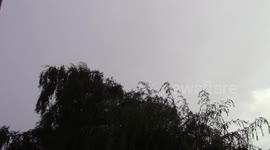 Huge bolt of lightning with nervous laughing in the back ground.