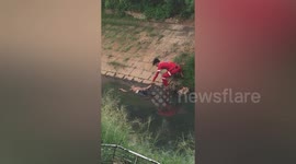 Paramedics mistake man cooling off in canal for drowning victim