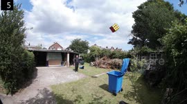UK man launches giant Rubik's Cube into wheelie bin