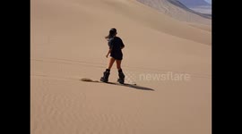 Girl Sandboarding Chile