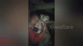 Touching moment Indonesian boy says final farewell to his favourite cow