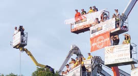 Speedway fans rent cranes to watch race during pandemic in Poland