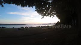 TIME LAPSE Reckless COVID-19 Crowds Ignore Restrictions in Downtown Vancouver Canada Beach at Sunset