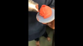 The baker instructs how to create a rose flower from whipped cream in two minutes
