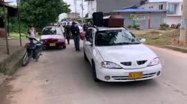 Representation of a funeral procession in Colombia to try to sensitize about the fatality of COVID-19
