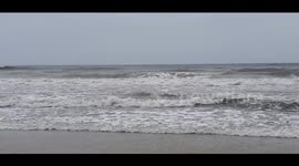 Isaias First Waves Crash upon North Carolina's Coast