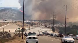 Smoke billows into air as Santa Clarita fire shuts down highway in California