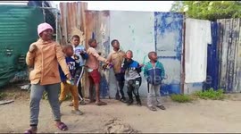 Township children make slingshots out of condoms