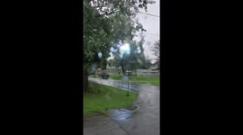 Power line burst into flame during storm leading to downed line in Delaware City, Delaware