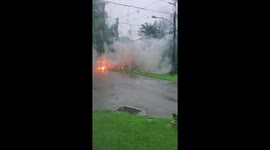 Electrical fire from power line on ground caused by storm in Delaware City, Delaware