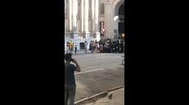 Police and BLM Protesters stand back as Protesters argue with NYPD