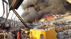 Beirut blast aftermath footage shows injured being stretchered away and windows blown out