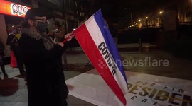 Opposition protesters celebrate Colombia's court ruling against former President Alvaro Uribe Velez