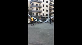 Cleaning the streets after the explosion, Mar Mkhael area near the port