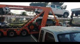 Trucker backs out slim road after wrong turn