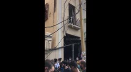 Jumping inside one of the building to clean it and to clean around it