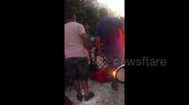 CPR given to victim of Beirut blast in amongst debris and rubble