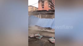 Shops collapse due to heavy rain in north China